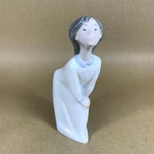 Lladro Girl Kissing Figurine