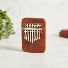 9 Note solid wood thumb piano
