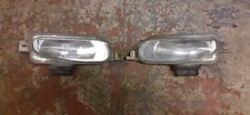 Pair of Ford Escort ('95-) Hella Fog Lights. Part No. 146895, 146896