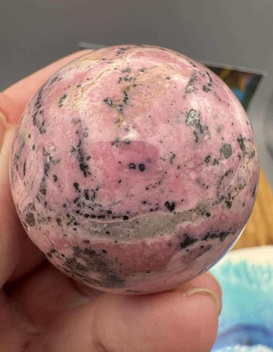 Crystal sphere rhodonite ball - sphere,