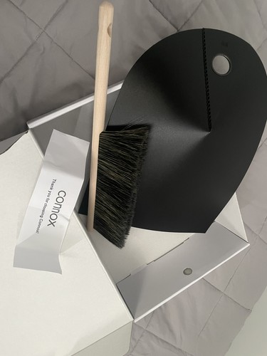 Black dustpan and brush terma - and,