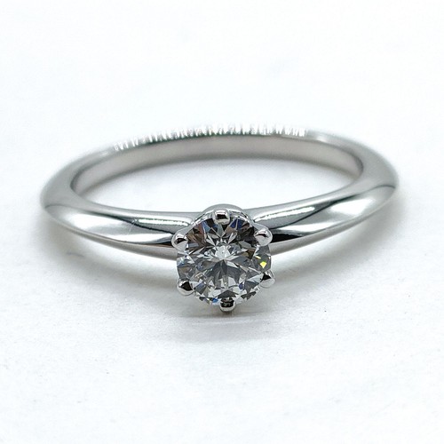Tiffany and ring solitaire - and,
