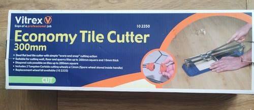 Tile cutter - tile, owned)