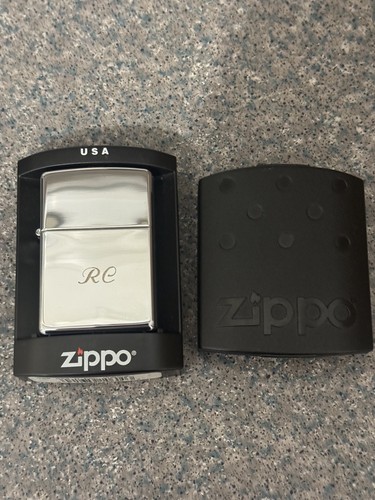 Zippo lighter unused and - unused, with