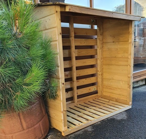 Tanalised wooden log store - log,