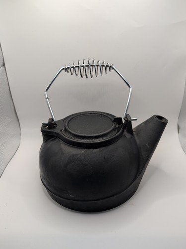 Black cast iron kettle - cast,