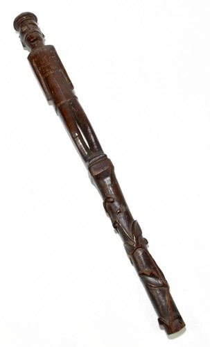 Carved cane present from - carved,
