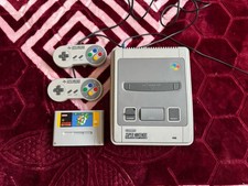 Nintendo SNES Console And Mario Game