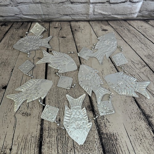 Aluminium stamped sitting - sitting, fish