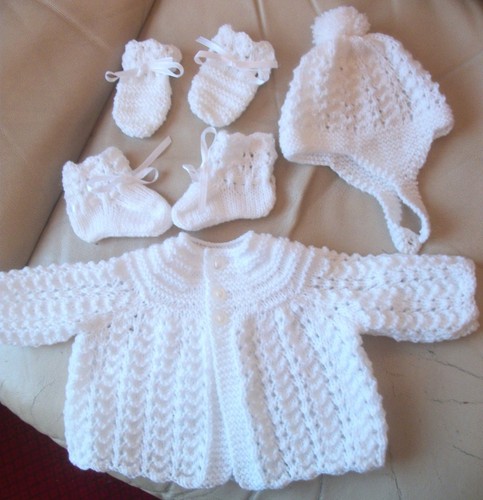 Hand knitted white boys - hand,
