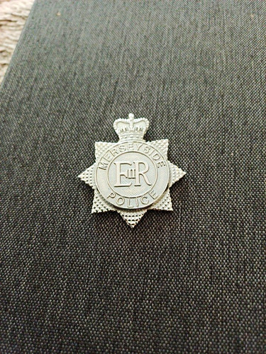 Merseyside police queen s - er, queen's