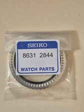 Brand New Seiko Black Bezel - Part No. 86312844 - Fits 5M62-0A19 & 5M62-0A10