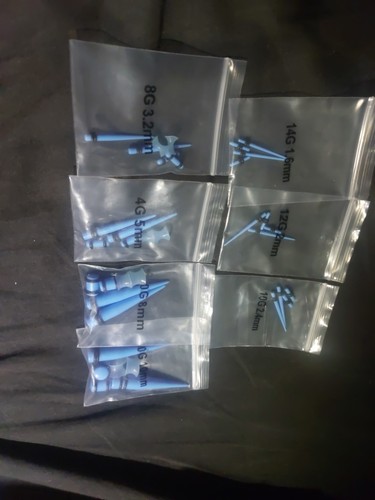 Ear stretching kit with - ear,