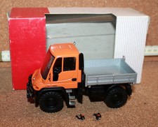 NZG 465 Unimog U 300 Municipal Version in Orange with Tipper Flatbed 1:50 New in Original Packaging