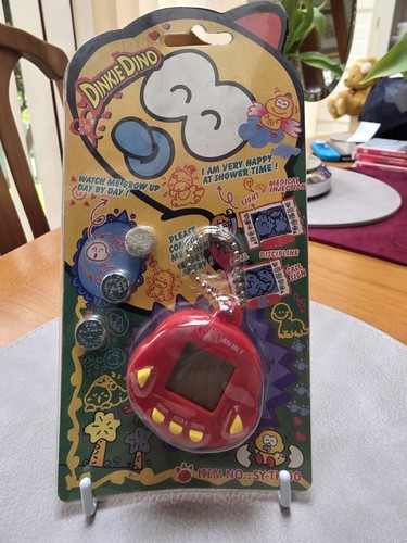 Rare retro tamagotchi dinkie - rare,