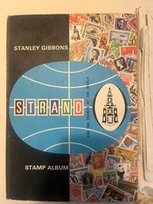 Stanley gibbons stamp album with hundreds of international stamps,
