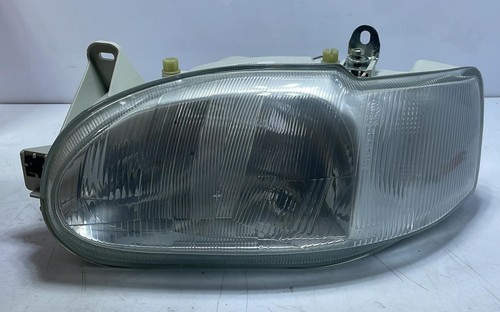 Original left front headlight - original,