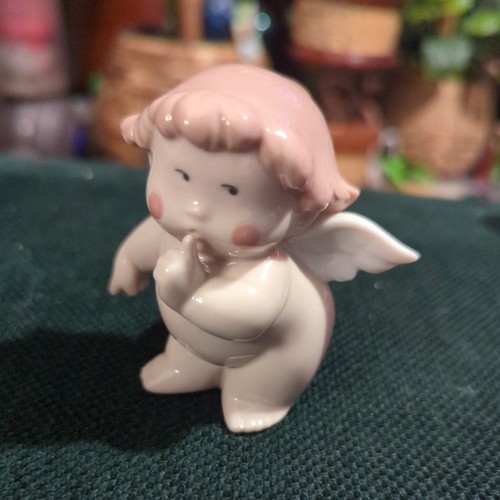 Nao lladro figurine - by,