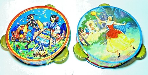 Pair vintage tinplate chad - pair,