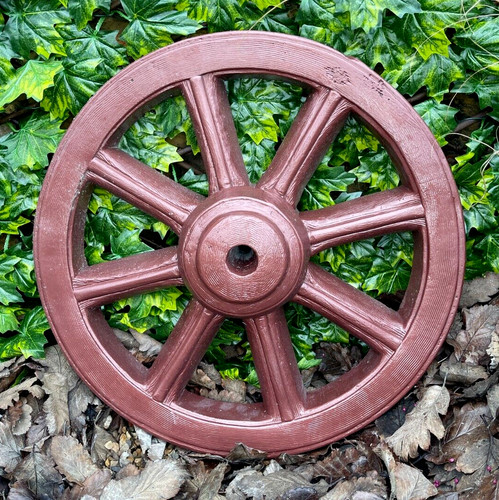 Concrete wagon wheel decor