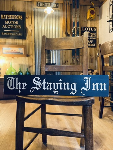The staying inn pub sign - staying,