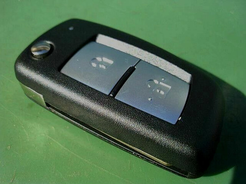 New button uncut remote key - new,