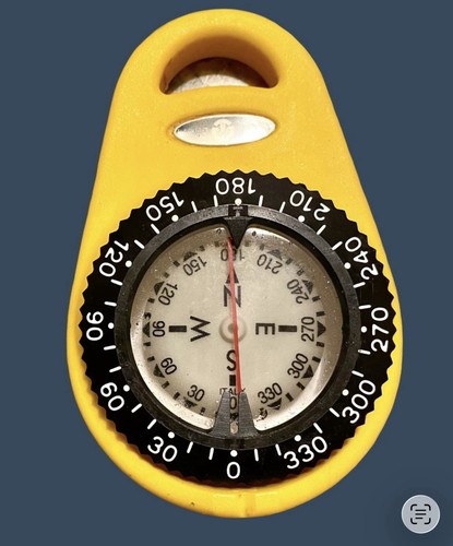 Hand bearing compass sailing - hand,