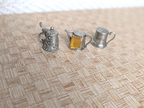 Pewter thimbles watering - 3x,