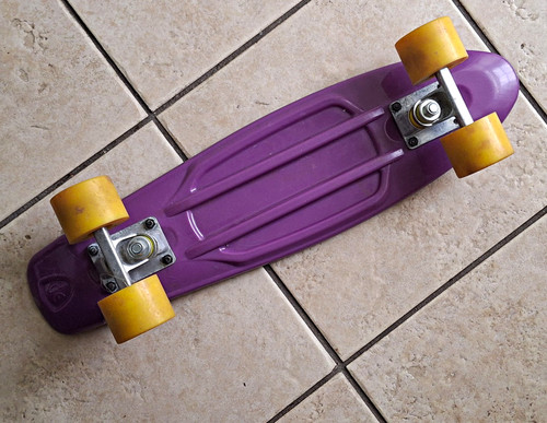 Purple plastic cruiser penny - plastic,