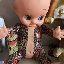 Japanese-style tattooed Kewpie doll