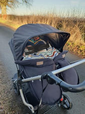 Mountain Buggy Duet Twin Carrycot Plus Converts to Parent Facing with Rain Cover