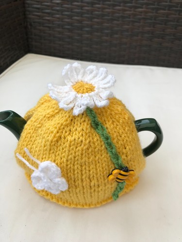 Hand knitted daisy - tea, cosy