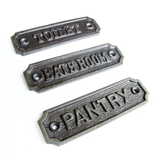Metal toilets door sign cast - toilets,