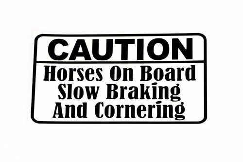 Caution horses board slow - caution,