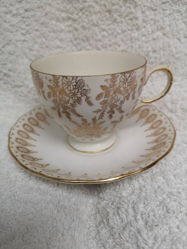 Royal vale floral gold - vale, bone
