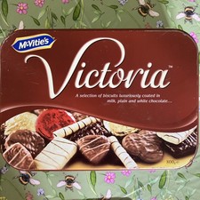 Charming medium sized Mcvities Victoria Buscuit Tin In Good Used Condition 