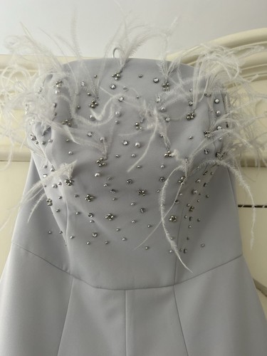 Coast women beaded feathered - coast,