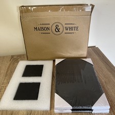 Maison and White Slate Place