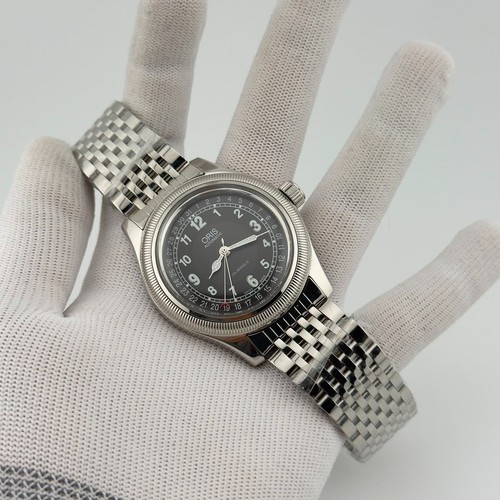 Oris big crown - big, pointer