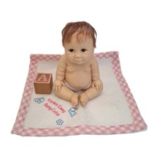 Miniature resin doll its not