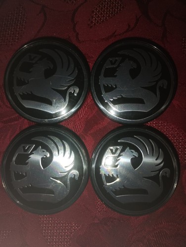 Vauxhall vectra wheel caps - vauxhall,