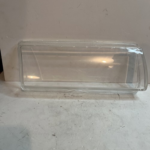 Left headlight lens cover - left,