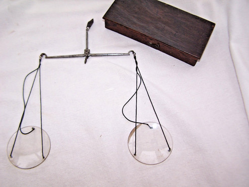 Vintage scales hand - scales, held