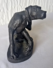 Bronze Effect Sculpture of a Large Breed Dog Scratching it's Ear.