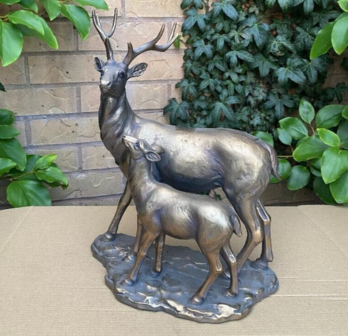 Large bronze stag and - and, fawn