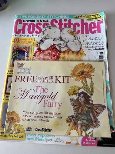 Cross stitcher magazine with - cross,