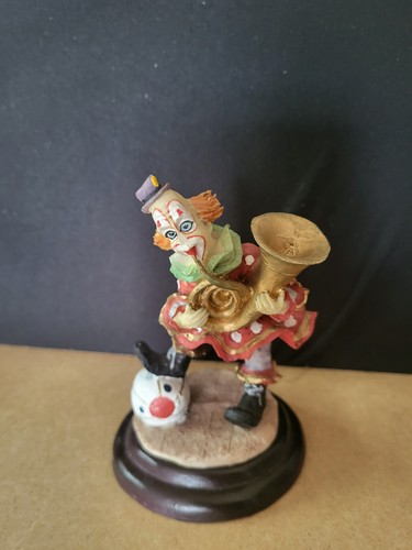 Musical clown playing brass - musical,