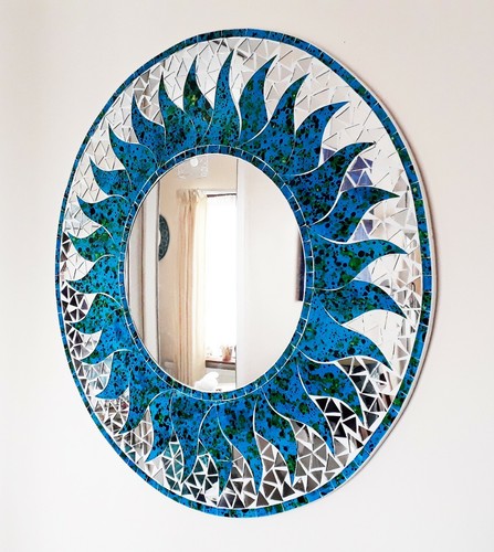 Round blue mosaic sun design