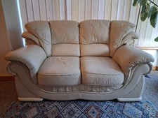Cream Leather Two-Seater Sofa In A Very Good Used Condition
