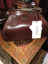 Gianni Conti Leather Gladstone Bag. BNWT Dark Brown, Width at Bottom 30cm Width